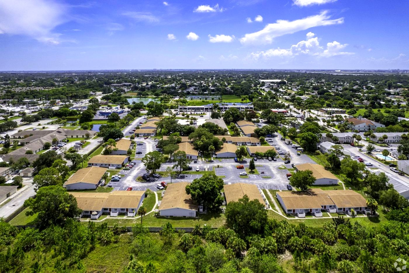 Aerial view of Palm Harbor Villas single-story apartment community in Melbourne, FL