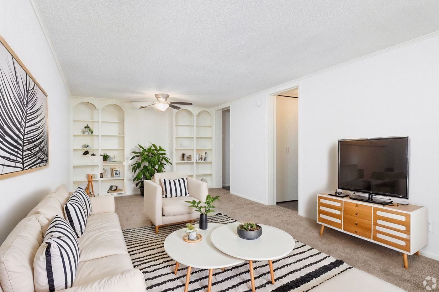 Staged dining area with table and chairs in a Palm Harbor Villas apartment